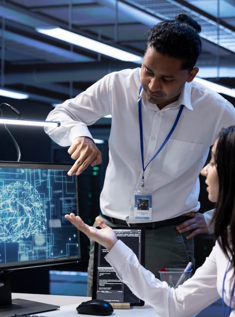 teamworking-colleagues-in-data-center-using-pc-to-YCYLJGV